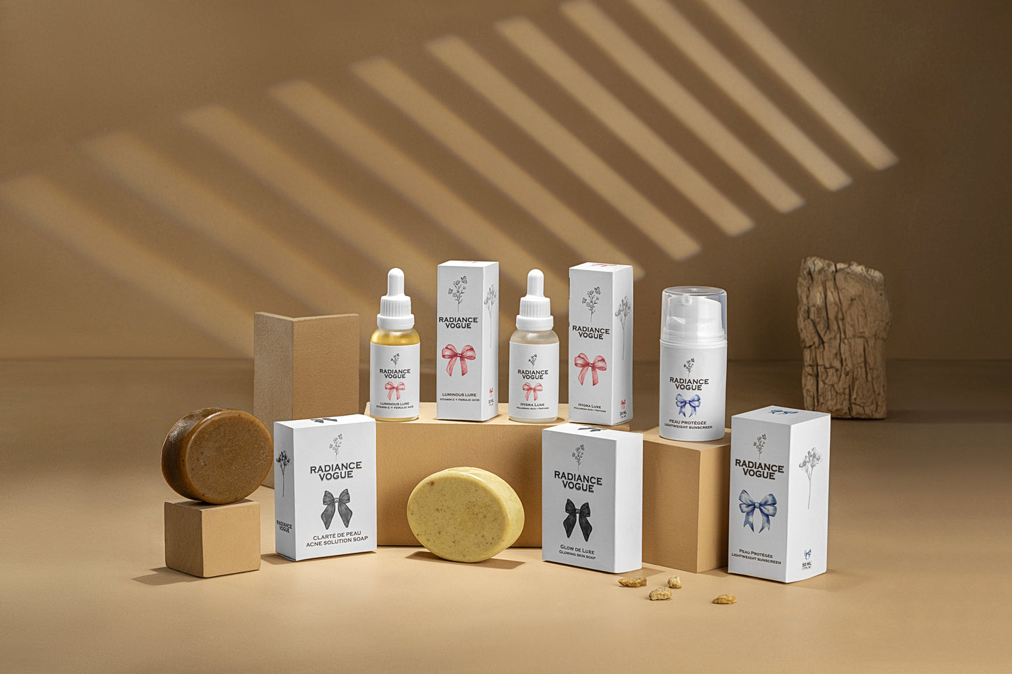 Cosmetic products including bottles, boxes, and a bar of soap on a beige background