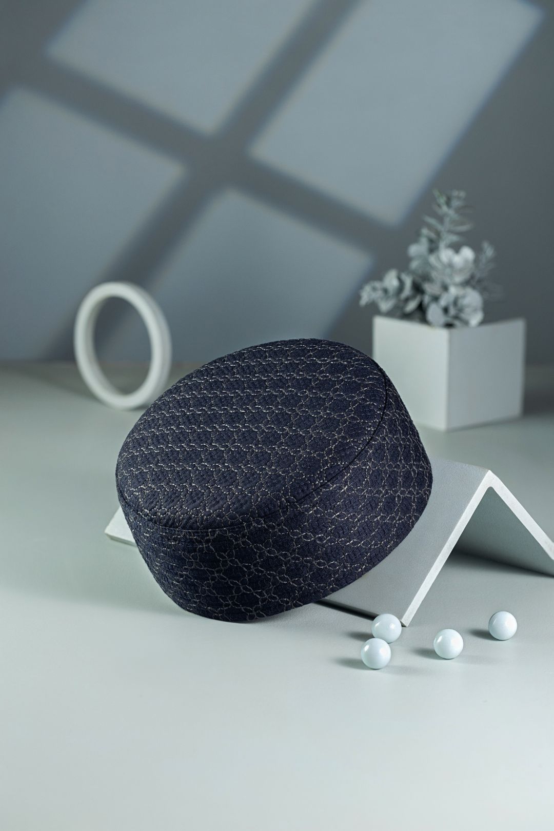 creative studio shot of prayer cap professional lighting 