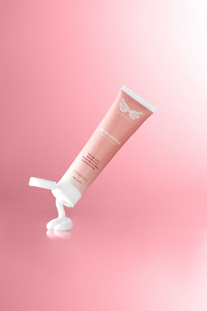 face wash action shot pink gradient background