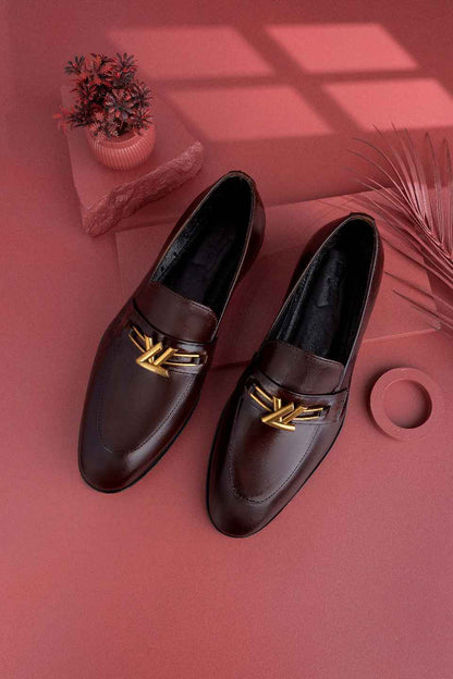 formal dark brown shoes creative studio shot on a pink background