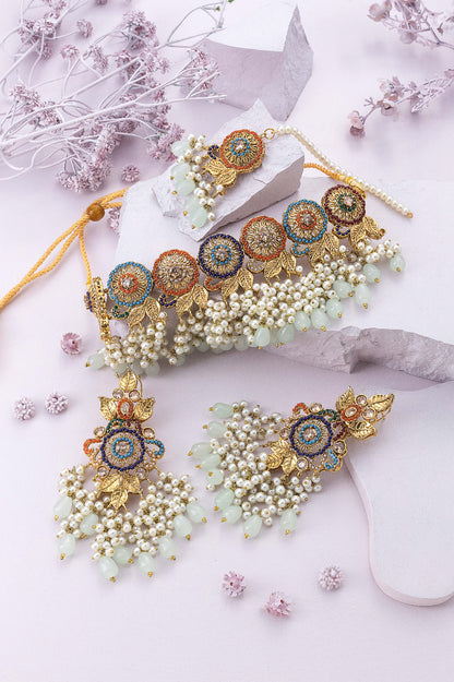 gold bridal jewelry set photography purple background