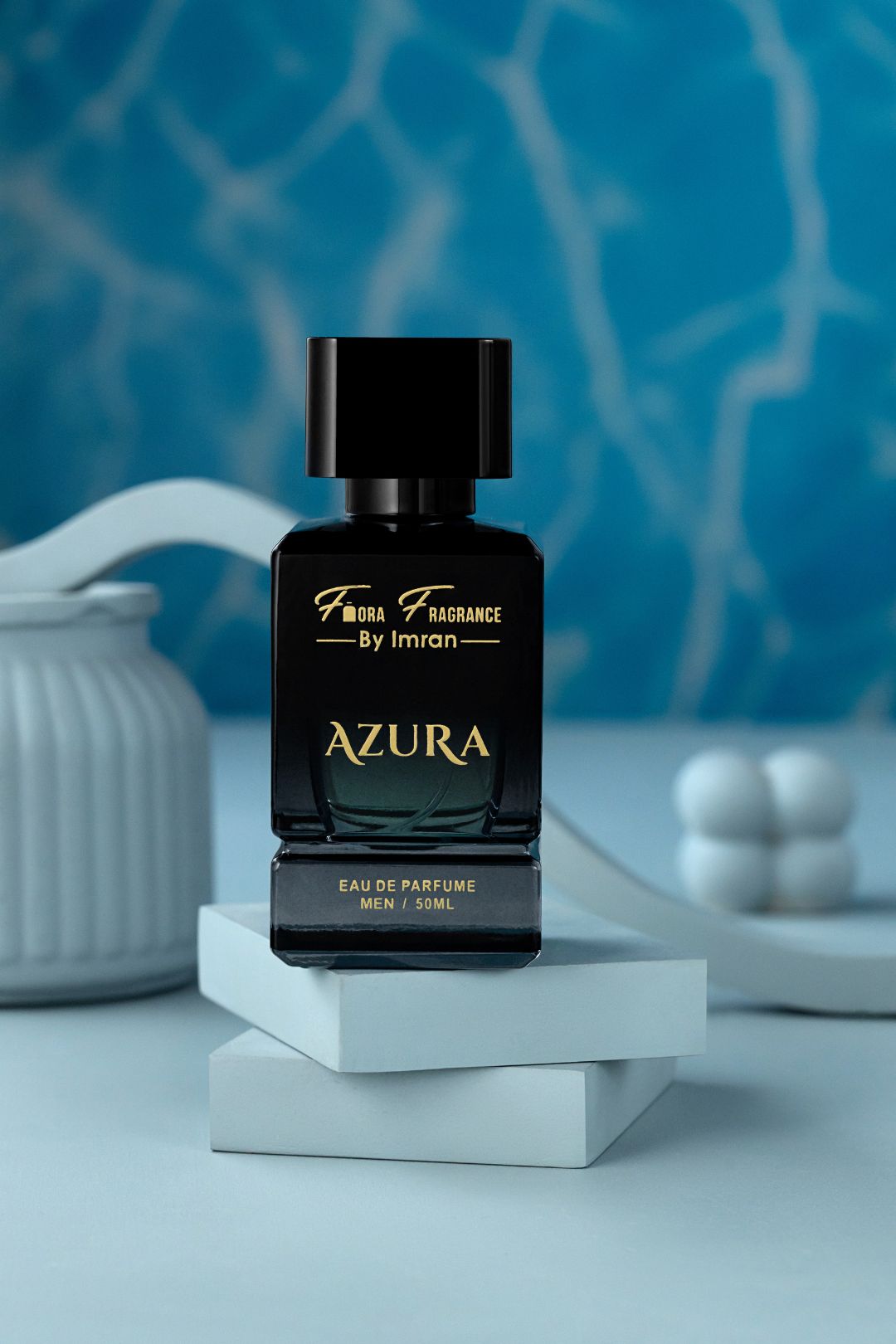 Luxury perfume product photography on blue studio background